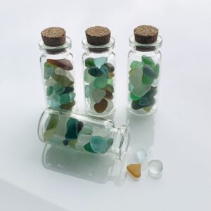 Mini flesjes gevuld met zeeglas